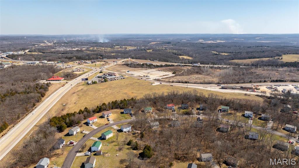 This 11.62-acre commercial lot is located at the high-traffic corner of Hwy 100 and Hwy AT in Villa Ridge, MO, just seconds from I-44. With its prime location, this property is ideal for a variety of commercial ventures, including hotels, strip malls, fast food establishments, restaurants, and more. The lot offers excellent visibility and easy access, making it a perfect choice for any business.
Nearly all utilities are nearby, streamlining development for your commercial project. Situated just 30 minutes from the St. Louis metropolitan area, this lot offers great potential with high traffic volume. Don’t miss out on this exceptional opportunity to invest in a prime commercial location! Location: Corner Location, High Traffic, Hwy/Interstate Frntg