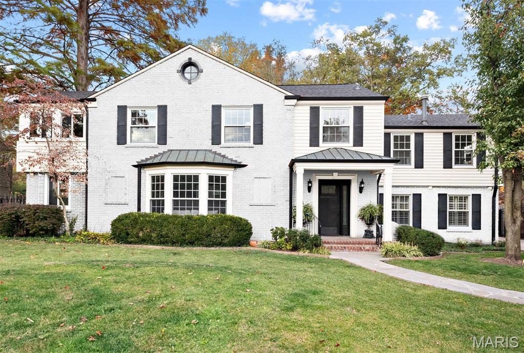 Completely renovated 4 BR & 3.5 BA home in a sought-after neighborhood in Ladue. Fresh neutral paint, refinished light hardwood floors, restored plaster walls, & moldings blend its contemporary style with traditional architecture. The first floor features a living room with a bay window & fireplace, two sets of double doors leading into a home office & a set into the dining room, family room, & an updated gourmet kitchen. Upstairs, a primary suite boasts a renovated spa-like bath with a European glass shower enclosure, custom cabinetry & a walk-in closet. Three more bedrooms with two additional renovated full baths & a laundry room complete the second floor. The lower level includes extra finished living space & an abundance of storage. Relax on the oversized patio overlooking a well-manicured backyard. A detached two-car carport, new HVAC, updated plumbing stack, a sump pump & dehumidifier. This home is centrally located among schools, shops & restaurants- one you won't want to miss. Additional Rooms: Sun Room