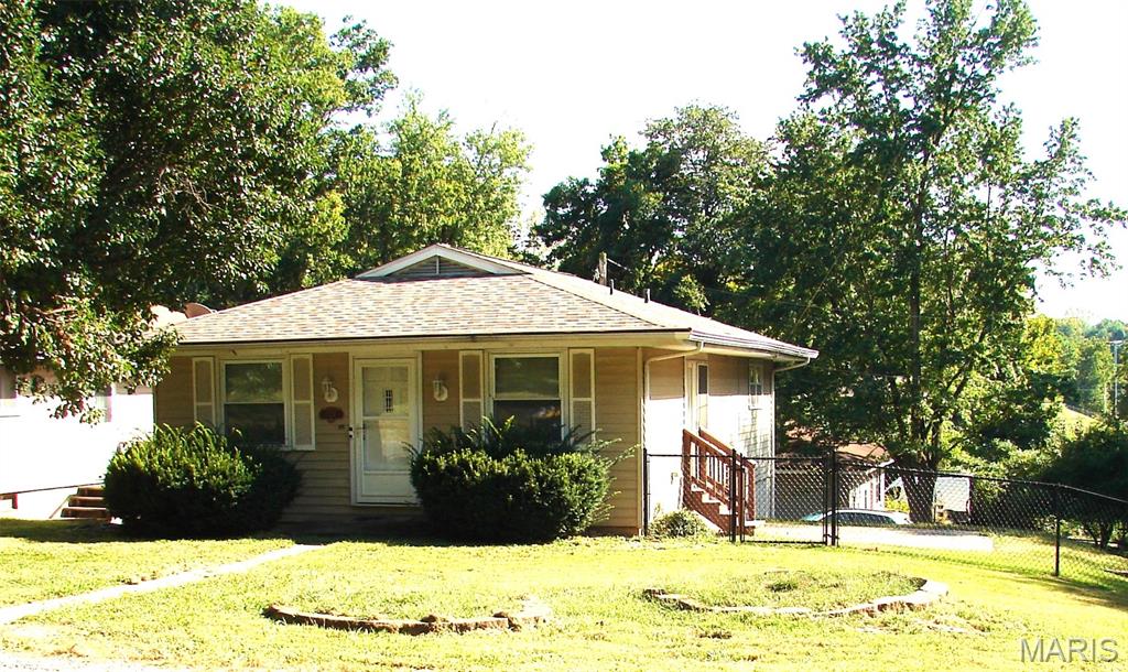This 3 bedroom, 2 bath home sits on a quiet street near downtown Edwardsville, and comes with stove, refrigerator, dishwasher, microwave, washer, and dryer, and features laminate floors, finished walk-out basement, brick patio off the dining area, attached one car garage and a partial fenced yard.  Close to the Watershed Nature Center and MCT Trailways.  Bus stop less than 5 minutes at IL-143 and Hunicke.  Available September 1.  Agent owned.  Schedule a Showing Today!