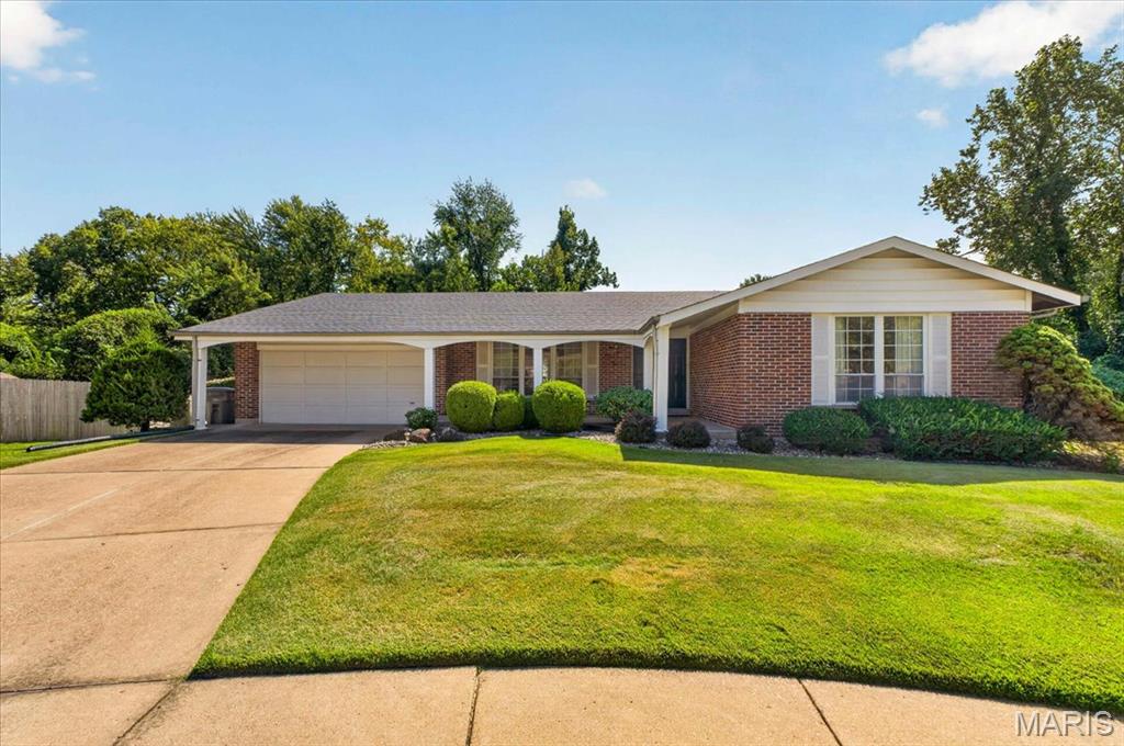 Welcome Home to 3616 Viembra Drive! Want to be in a new home for the holidays? Located in a quiet cul-de-sac in the Parc Argonne Subdivision and backing to common ground, this 3 Bed, 2 Full Bath Brick Ranch Home has been meticulously maintained for the last 20 years. The covered Front Porch welcomes you to the home and leads you into the entry foyer. The Living Room is adorned with original hardwood trim throughout, while the large picture windows bathe the room in natural light. The Living Room flows into the Formal Dining Area with seamless access to the eat in Kitchen. The timeless Kitchen with Cherry cabinets, double oven, and pantry conveniently connects to the 2 car garage making it simple to unload groceries. The Family Room with Decorative Fireplace offers the perfect space to relax or entertain. Down the hallway you’ll find the Primary Bedroom with dual closets and private Full Bath with walk in shower. Two additional bedrooms and full hall bath complete the main level. The unfinished lower level is a clean slate ready to match your lifestyle and walks out into the fenced in backyard. Enjoy a cup of coffee or wind down in the evening in the screened-in porch or on the back deck overlooking the private back yard. This all-electric home offers an economic way of living in a central location to all North County has to offer.  You won’t want to wait around and miss this outstanding opportunity!