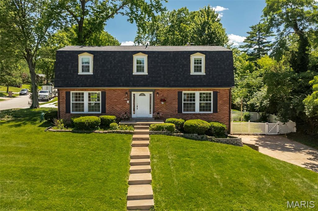 Welcome home to 9822 Meadowfern Dr, a move-in-ready gem sitting in the heart of the highly-rated Lindbergh School District. If location is everything, this is it—you’re just a short, easy stroll away from the sprawling green spaces and brand-new playground at Crestwood Park, Long Elementary and Truman Middle School.

Inside, the home feels incredibly airy and bright, thanks to a fresh coat of paint throughout and gleaming hardwood floors. You'll immediately notice the newer replacement windows that flood the space with natural light, all finished with stylish new window coverings for when you're ready to cozy up. The layout is designed for easy living, featuring an updated hall bath and powder room. In the primary suite, you’ll find a true retreat with two closets, a newer vanity, and a sleek walk-in shower.

The heart of the home is the family room, where you can kick back by the cozy gas fireplace on chilly evenings. This space, along with the lower level, features brand-new carpet, making it perfect for movie nights or a dedicated play area. The kitchen and breakfast area transition seamlessly to the outdoors, where a fully fenced backyard offers plenty of room for summer BBQs and pets to roam.

Beyond the aesthetics, the "big ticket" items are already checked off your list. With a brand-new roof, a new electric panel, and a newer water heater, you can move in with total peace of mind. It’s rare to find a home that balances this many modern updates with such an incredible, community-focused location. Don't miss your chance to call Meadowfern home!