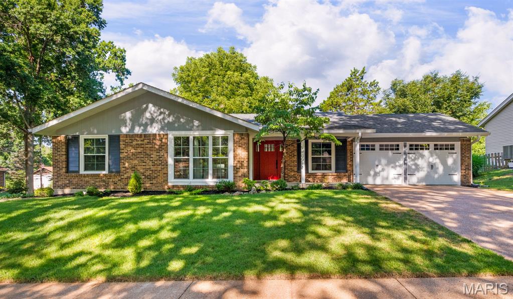 Welcome home to Tree Hill Ct! Offering comfortable living spaces, thoughtful updates, and flexible room to fit a variety of needs. From the inviting curb appeal to the open interior layout, this property is designed to make everyday living easy and enjoyable.
The main living area features abundant natural light, a practical floor plan, vaulted ceilings and easy flow between the living room, dining area, family room and kitchen. The expanded kitchen includes newer appliances, tall cabinetry, granite counters, generous storage, room for a breakfast table, and convenient access to the covered patio and fenced backyard, making it a great space for everyday meals or entertaining.
Additional highlights include roomy primary suite with triple closet, updated bathrooms and finished lower level with rec room and his & her home offices.  Features include architectural roof 2019, Lennox furnace and 16 SEER A/C 2022, beautiful front entry door 2026, insulated replacement windows, newer lighting, fans, aluminum compatible switches and outlets, hardwood flooring, and fresh paint. The awesome corner location on 2 low traffic streets offers convenient access to shopping, dining, parks, Parkway schools, highways, and all that Manchester living has to offer. All appliances stay, wired for AT&T fiber, Manchester code inspection repairs have been completed except nonfunctional fireplace.
Do not miss the opportunity to see everything this home has to offer. Schedule your showing today and experience the space, comfort, and convenience firsthand!