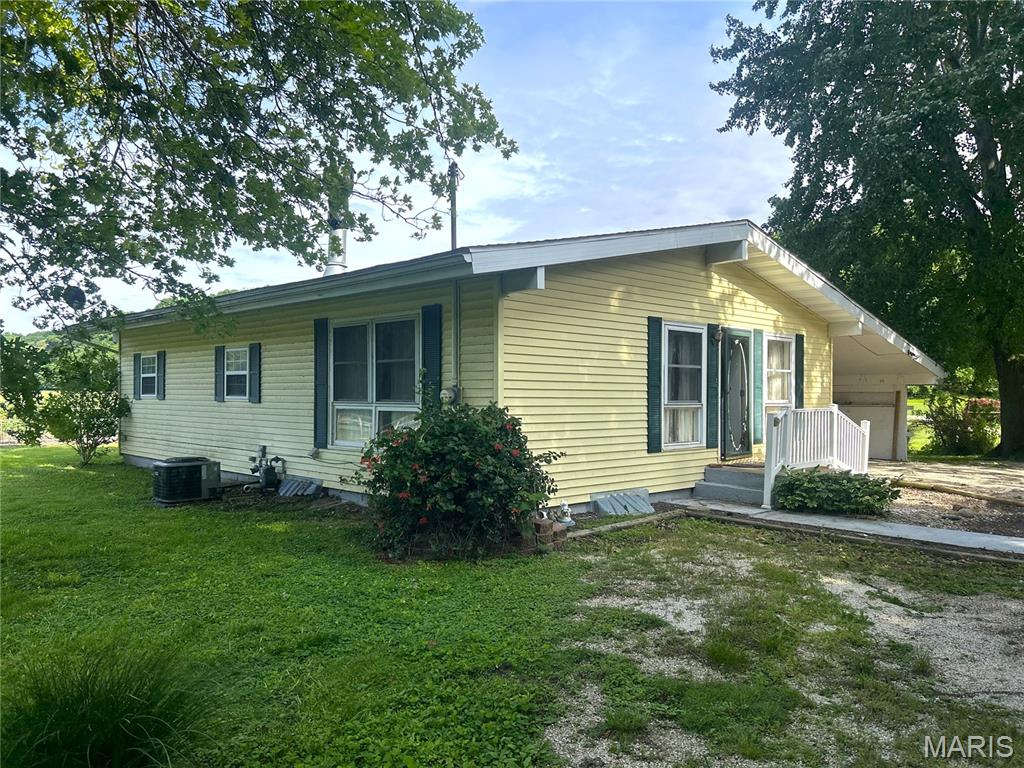 Looking for a cute home in a quiet location on the outskirts of Eldred only three miles from the Illinois River? We have just the property for you! Tucked away with a beautiful view of the bluff, this 2 bedroom (with possibility of converting utility room back to a 3rd bedroom), 2 bathroom home with a partial basement is subject to little traffic making for a very peaceful setting. A couple favorite elements of this property are the good-sized yard and great fireplace setup. Check out this exceptional starter home or downsize opportunity.