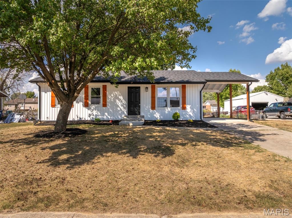 ACTIVE - showings start 9/17/2026. ADORABLE ranch home on a full basement and a fenced backyard! Three bedrooms and a bath on the main level. Brand New - Siding, soffit and fascia gutters, new plumbing, new flooring LVP and carpet, new paint, new kitchen cabinets and granite counters, new appliances, bathroom all new, new light fixtures, new gas piping, landscaping, new mailbox. Did all of the work that was needed in the basement, piers, strapping, waterproofing, and transferable warranty. Fenced backyard, new concrete slab under carport, exterior doors, sidewalk.  Professional photos are in - great for USDA, VA or FHA financed buyers! Make sure to see this one in person while it's active!