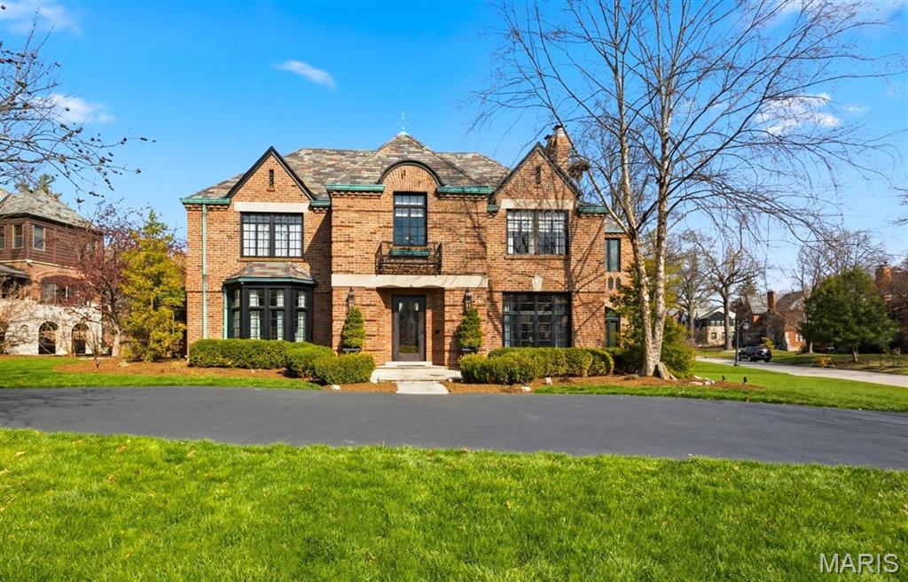 Another chance at this sought-after, fully renovated home! The previous buyer’s circumstances changed, giving you a rare opportunity to own this magazine-worthy property.  This exceptional home offers an impressive blend of space, style, and sophistication, featuring a main floor, second level, basement, and an oversized garage addition. Renovated with meticulous attention to detail, every inch of this residence showcases magazine-worthy finishes and thoughtful design. Designed for both everyday living and entertaining, the main floor boasts a seamless flow with a light-filled dining room, a stylish breakfast/bar area, and a gracious living room anchored by a beautiful fireplace. Two sunrooms provide additional versatile living space filled with natural light. The chef’s kitchen is a true centerpiece, featuring custom cabinetry, a stunning Spanish tile floor, a large island, and an open layout that flows into a comfortable gathering space—ideal for a TV area. Just off the kitchen, you’ll find a spacious mudroom, walk-in pantry, and one of the two main floor half baths. Upstairs, the second level offers a luxurious primary suite complete with an ensuite bath and a generous walk-in closet. A second ensuite bedroom with a walk-in closet has direct access to the upper-level sunroom. Two additional bedrooms, a third full bathroom, convenient laundry room, and an impressive great room with a wet bar complete this level. The partially finished basement expands the home’s versatility, featuring a refrigerated wine room and ample space for a home gym, creative studio, or additional recreation. The outdoor space is equally impressive, offering a spacious patio and thoughtfully designed, lush landscaping—perfect for relaxing or entertaining. Seamlessly blending luxury, character, and functionality, this remarkable home is truly one of a kind. The impressive list of all the improvements is available upon request.
