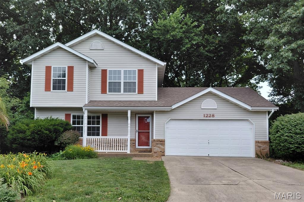 Well maintained two story at the end of the cul-de-sac. 3 bedrooms, 3 baths, large eat-in kitchen opens to a deck overlooking wooded backyard. Large family room in the walk out lower level. The newer sliding doors open to a patio. All appliances stay including refrigerator in the garage and the washer & dryer. All bathrooms have been updated. New flooring throughout most of the home. New garage door opener with remote can also be accessed through an app. HVAC was replaced in 2024. Gutter guards have been installed so no need to climb on a ladder to clean the gutters! Great location just minutes from uptown Collinsville, shopping & interstate access. Selling AS IS.