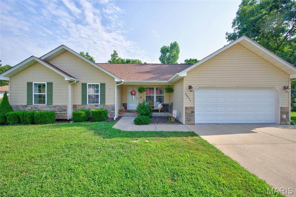 Perfectly positioned on a spacious corner lot, this charming three-bedroom home offers the best of both worlds—a convenient location just minutes from town with the peaceful feel of country living (and yes, the chicken coop can stay!). From the inviting front porch, step into a bright, vaulted living room that flows seamlessly into the dining area and kitchen, creating an ideal space for everyday living and entertaining. The kitchen shines with new appliances, a breakfast bar, stylish tile backsplash, and updated lighting. The primary suite features a walk-in closet and an ensuite bath complete with a jetted tub, separate shower, and double vanity. Two additional carpeted bedrooms provide comfort for family or guests, along with a second full bathroom, conveniently located off the hall.
Step outside to enjoy the spacious deck overlooking a level, fully fenced backyard that's ready for it all—playsets, garden beds, backyard barbecues, and even your own flock of chickens. There's plenty of room for your four-legged family members, too—this yard is definitely dog approved! New roof in Sept 2026!!!
