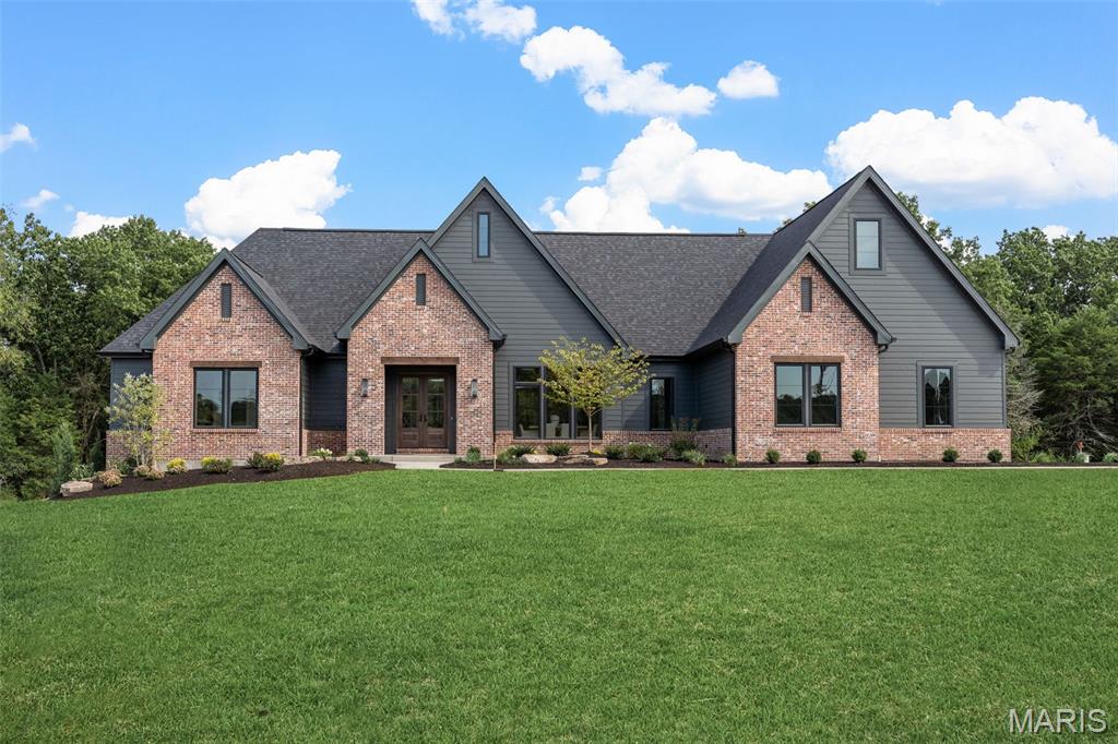Forrest Homes proudly presents the AWARD WINNING Aria Model! This is to Be Built Home (this home is not built, it currently is a vacant lot) This home is a split 4-bedroom ranch plan with 3.5 baths. This innovative floorplan is a little over 3,000 sq ft.   One side of the home offers a private primary suite with large WIC closet, while the other side of the main home area you will find 3 bedrooms and 2 baths. This home is loaded with features including but not limited to 10' ceilings throughout, 11' ceiling in the Great Room, 8' interior doors as a standard, gas fireplace, engineered hardwood floors throughout main living area, 48" Monogram range, wood hood, quartz countertops, a scullery (with micro, cabinets & shelving), custom cabinetry, 3 car side entry oversized garage, stairs to basement from garage, James Hardie siding, gas and cable in subdivision. Spectacular setting! WSD Schools! BUILD ON THIS LOT OR BUILD ON YOUR LOT