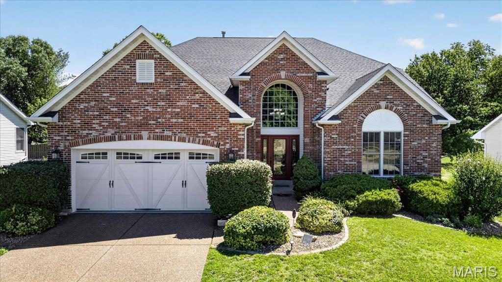Move-In Ready & Beautifully Updated!

Welcome home to this stunning 1.5-story, full-brick-front home offering approximately 3,255 sq. ft., 5 bedrooms, 3.5 baths, and an oversized 2-car garage. From the moment you step inside, you’ll appreciate the thoughtful updates and spacious, versatile floor plan.

The two-story entry foyer features a custom window and opens to a private office/den and separate dining room—a floor plan that offers something a little different from the traditional layout. The spacious eat-in kitchen boasts granite countertops, white 42-inch cabinetry, tiled backsplash, stainless steel appliances, gas range, breakfast bar, and walk-in pantry.

The inviting family room features a gas fireplace and a wall of windows, filling the space with natural light. The main-level primary suite provides a private retreat with a spacious bedroom, luxurious master bath, and generous walk-in closet.

Open stairs lead to the upper level, where you’ll find four spacious bedrooms plus a dedicated media room complete with a screen for streaming your favorite movies or sporting events. A convenient closet keeps all your entertainment components neatly tucked away.

Lower level features large rec room with bar area, sleeping room with full ensuite bath and luxury sauna.

Special features and updates include: composite deck, sprinkler system, upgraded front and garage doors, Nest thermostat and Protect, updated light fixtures, ceiling fans, main-floor laundry with utility sink, newer carpet, fresh neutral-gray paint, wood flooring throughout the main level, vinyl siding, enclosed soffits and fascia, brick mailbox, and so much more!

Enjoy fantastic subdivision amenities including three swimming pools, pickleball courts, and a clubhouse available for rent. Located adjacent to The Links at Dardenne Golf Course and within the highly sought-after Fort Zumwalt West School District.

This exceptional home is move-in ready and offers the space, updates, amenities, and location you’ve been looking for!