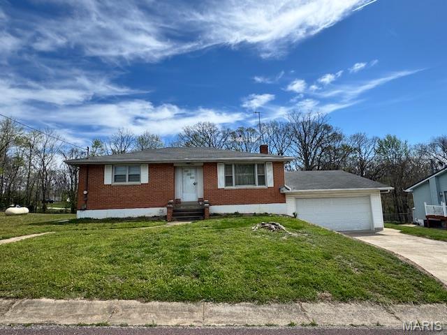 Great opportunity to bring this full brick home back to life and make it your own! The main level features a spacious eat-in kitchen, formal living room, two bedrooms, and a full bath. The lower level offers added versatility with a second kitchen, half bath, family room, and a large addition off the back—perfect for a recreational room, home gym, or entertaining space.
An oversized attached garage provides plenty of storage and workspace. With some updating and repairs, this property has the potential to become a truly beautiful home. Selling "AS IS"