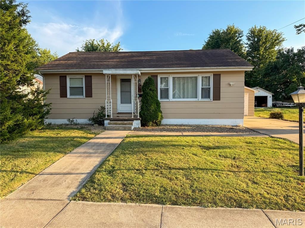 Cute, comfortable, and ready to welcome you home! Located at 423 E. Fayette St., Pittsfield, IL, this one-story ranch offers a functional layout with a spacious living room, eat-in kitchen with plenty of cabinet space, stainless steel appliances, and updated flooring throughout much of the home. Newer thermal windows and electric baseboard heat add to the everyday comfort. Outside, you’ll find a fenced backyard with patio space and a detached garage offering room for parking, storage, or a workshop. A cozy Pittsfield home with plenty to offer!