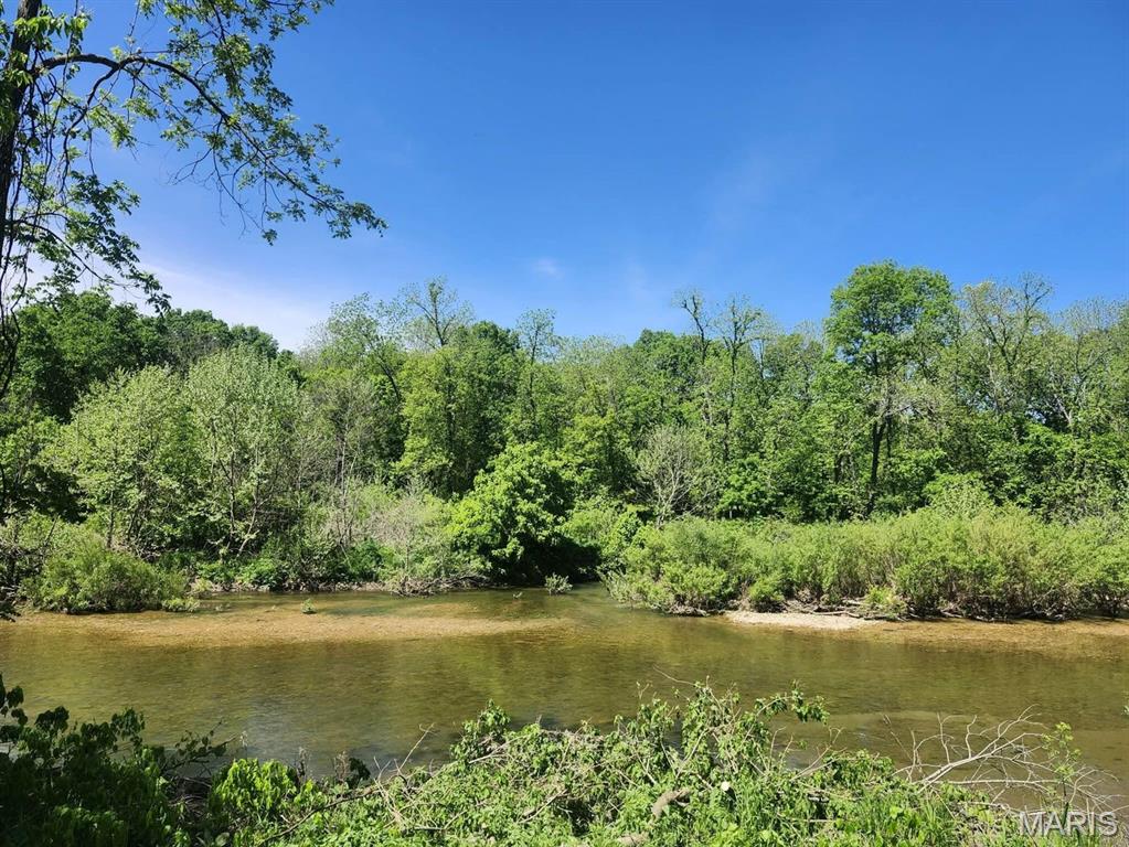 29.5± acres just outside Hartville, MO offering the kind of features everyone is searching for. This diverse property combines privacy, access, and natural beauty with electric already on site and two convenient entry points off High Drive. Enjoy sweeping views overlooking the Gasconade River bottom, along with direct Gasconade River frontage for recreation and relaxation. A year-round spring provides a reliable water source, and scattered mature walnut trees add both character and long-term value. Multiple potential home sites sit safely out of the flood plain, giving you flexibility to build your dream home or weekend retreat. The land is a haven for wildlife, making it an excellent hunting property with abundant deer and turkey. Whether you're looking to build, invest, or simply escape, this tract checks all the boxes--water, views, access, and privacy. Properties with this combination don't come along often.