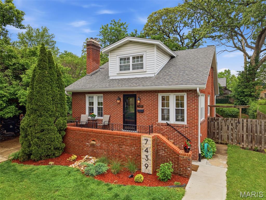 Welcome to 7439 Wellington Ave! This charming home in heart of University City has been beautifully renovated and has 4 bedroom, 2 bathroom. This brick home blends classic character with thoughtful upgrades throughout. Step inside to a light-filled living room featuring a cozy wood-burning fireplace and original refinished hardwood floors that flow seamlessly into the dining room and main-level bedrooms. Just off the living room, a bright sunroom offers the perfect flex space for a home office, playroom or relaxing sitting area. The updated kitchen is sure to impress with new stainless steel appliances, quartz countertops and a stylish tiled backsplash. The main floor also includes two spacious bedrooms, a beautifully updated full bath and a separate dining room ideal for gatherings. Upstairs, you’ll find two additional bedrooms with oversized closets, a second updated full bath and a versatile bonus room that is perfect for a nursery, office, play space or extra storage. Enjoy the outdoors from the inviting front porch or unwind in the expansive backyard complete with a patio that is perfect for entertaining or quiet evenings at home. The walk-out basement provides additional living space and plenty of storage options. Conveniently located near parks, dining, shopping and just minutes from Clayton, Highway 170 and more, this home offers both comfort and accessibility in a prime location. A perfect blend of character, space and updates, this University City gem is ready to welcome you home.