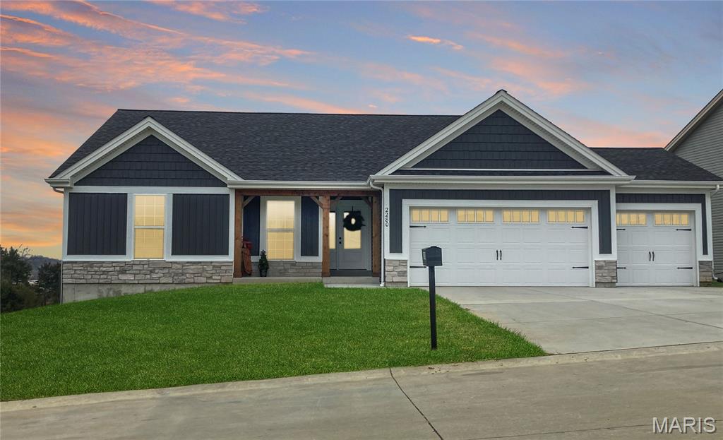 Experience small-town charm with modern new construction in the heart of New Haven, Missouri! This beautiful 3 bedroom, 2 bath home with a spacious 3-car garage offers the perfect combination of style, comfort, and location. Inside, you’ll love the open floor plan featuring 9’ ceilings, abundant natural light, and a stunning quartz countertop kitchen designed for everyday living and entertaining alike. 
The highlights of this home include: 3 car garage, open floor plan, upgraded flooring, 9' high ceilings, modern fixtures, quartz countertops, island kitchen, 12x12 composite back deck that backs to trees, and upgraded front elevation with plenty of curb appeal!

Step outside and enjoy the peaceful backyard that backs to trees, creating a private setting rarely found at this price point. Conveniently located within walking distance to parks, schools, and community amenities, this home offers the lifestyle so many buyers are searching for today.
Living in New Haven means enjoying the charm of a welcoming rivertown community known for its wineries, local restaurants, small-town events, and scenic surroundings - all while being just 10 minutes from Washington for shopping, dining, and everyday conveniences. If you’ve been dreaming of a quieter pace without sacrificing accessibility, this home is the perfect opportunity to enjoy the best of both worlds.