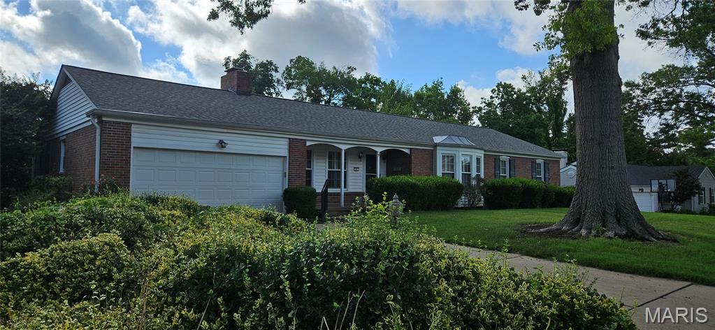 Here is a rare opportunity to move in to this sought-after Glendale neighborhood! The home is being sold-as-is, so you can update everything in your own style. A new roof was put on in 2025, the wood floors are in excellent shape, and you'll love the screened-in porch. On the main level, there are 3 bedrooms, a large living room with a fireplace, and a cozy separate family room. The primary bedroom has a full bath attached, and there's a large bath in the hall that also houses a stackable washer/dryer. The lower level is a walk-out with a large rec room, a bar, and a large bedroom with a half bath. So much space and potential there. You'll fall in love with the whole street.