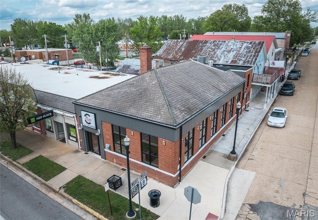 Welcome to 100 N Jefferson St in Downtown, St James, Missouri! Lovingly restored to it's Art Deco inspired roots, this 1929 built St James Bank building has been updated in almost every way possible - all new electrical, wood & tile flooring, stucco, windows, doors, siding, interior stairs, etc. No local expense was spared when it came to the detailing. The whole project was overseen by well known local builder, Ron Moreland, and his crew. The windows and doors were custom designed by Miller Glass, the electrical was done by the late Billy Durrett, wood detailing and trim was done by John Gorman, the interior stucco was done by Joey Auxier - and the list goes on. Come own a piece of St James, MO history AND enjoy being right downtown in the middle of all the action! Building could be sectioned into two commercial spots w/ city approval. There is a full bath in the back/side entry section and a 1/2 bath was added to the upstairs "boardroom". Call for more info and private tour!