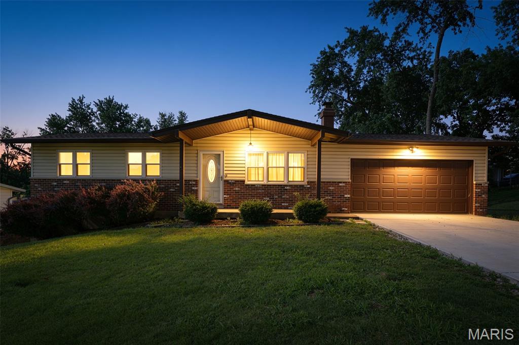 Welcome to 2831 Corral Estates in Arnold! This ranch offers the perfect combination of space, functionality, and opportunity. Situated on a large lot with a fully fenced backyard, this home provides plenty of room for entertaining, pets, gardening, or simply enjoying the outdoors. Inside, you'll find three bedrooms and two full bathrooms, a cozy fireplace, and a functional layout designed for everyday living. The finished double walkout lower level adds valuable living space and offers endless possibilities for a family room, recreation area, home office, workout space, or hobby room. A second full bathroom on the lower level adds convenience. Need storage? This home has you covered with an unfinished basement area and a dedicated storage room, providing ample space for seasonal items, tools, and equipment. The oversized driveway and attached two-car garage offer ample parking and extra storage. Located in a desirable Arnold neighborhood with convenient access to shopping, dining, parks, schools, and major highways, this property offers the perfect balance of privacy and convenience. Whether you're looking for your first home, room to grow, or a property you can personalize over time, this home is full of potential and ready for its next owner. Don't miss your opportunity to make this gem your own and schedule your showing today!