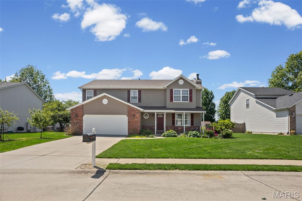 Welcome home to this spacious and beautifully updated 5-bedroom, 4-bath home—perfectly designed for both everyday comfort and making lasting memories. From the moment you step inside, you’ll appreciate the warm, inviting feel and open floor plan that allows for an easy flow between living spaces, ideal for gathering with family and friends.
The heart of the home is the updated kitchen, featuring gorgeous granite countertops, custom cabinetry and all appliances included—ready for everything from weeknight dinners to holiday hosting. Main floor laundry adds everyday convenience right where you need it.
Upstairs, you’ll find a generously sized family room with brand new flooring and a cozy fireplace, creating the perfect spot to unwind at the end of the day. Four bedrooms are located on this level, including a spacious primary suite complete with a walk-in closet and private bath—your own relaxing retreat.
The finished lower level offers even more room to spread out, with an additional family room, full bath and a 5th bedroom.
Step outside and enjoy peaceful mornings on the covered front porch or evenings on the covered back patio, overlooking garden beds ready for your personal touch. Thoughtful updates throughout include fresh paint, a brand new roof, siding and garage door on the attached two-car garage (2026), plus HVAC (2021),  water heater (2025) and all windows on back of the home replaced (5/2026) giving you peace of mind for years to come.
This truly move-in ready home blends space, style and comfort—ready for you to settle in and make it your own.