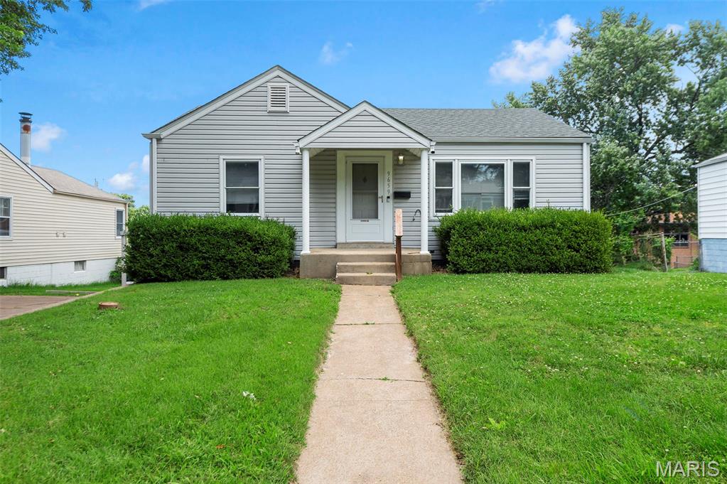 This 3 bedroom, 2 bath home offers an ideal blend of space, functionality, and everyday convenience. A standout feature is the massive outbuilding, making this home perfect for car enthusiasts, motorcycle lovers, hobbyists, or anyone in need of exceptional storage or workshop space. Inside, you’ll find hardwood floors, white kitchen cabinets, a cozy wood-burning stove, and a partially finished basement that provides additional living or recreational space. Ample storage throughout the home ensures everything has its place, while the attached carport adds everyday ease and practicality. Conveniently located just minutes from shopping, dining, entertainment, major highways, and only 10 minutes from St. Louis Lambert International Airport, this home boasts unmatched accessibility. Whether you’re looking for an investment property or searching for a home that you can make your own, this home is full of potential and ready for its next owner. Schedule your showing today!