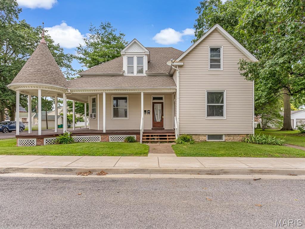Investment opportunity in the heart of Millstadt! This well-maintained four-unit residential property offers a desirable mix of two 1-bedroom/1-bath units and two 2-bedroom/1-bath units. The building combines historic character with practical updates, featuring beautiful hardwood floors, original woodwork, spacious rooms, updated kitchens and bathrooms, and luxury vinyl plank flooring. Each unit includes a refrigerator and electric range/oven, and all four units have separate electric meters.

Major improvements include a new roof in 2014, new siding in 2016, and a new garage roof in 2026. Additional highlights include inviting covered porches, a large shaded yard, mature trees, a detached two-car garage, and a prominent corner location. Whether expanding an investment portfolio or exploring an owner-occupant opportunity, this distinctive four-unit property offers character, versatility, and additional income potential.