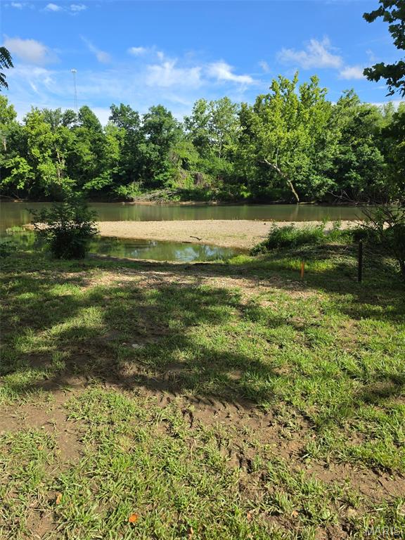 Lot 5 - ON THE BIG PINEY!!  Beautiful location in between Rolla and St Robert. Close to I-44, easy access for camper, fishing, or camping. Electric available on site, large gravel bar in the water. Perfect location and priced right. 3 lots already SOLD, call today before its too late.