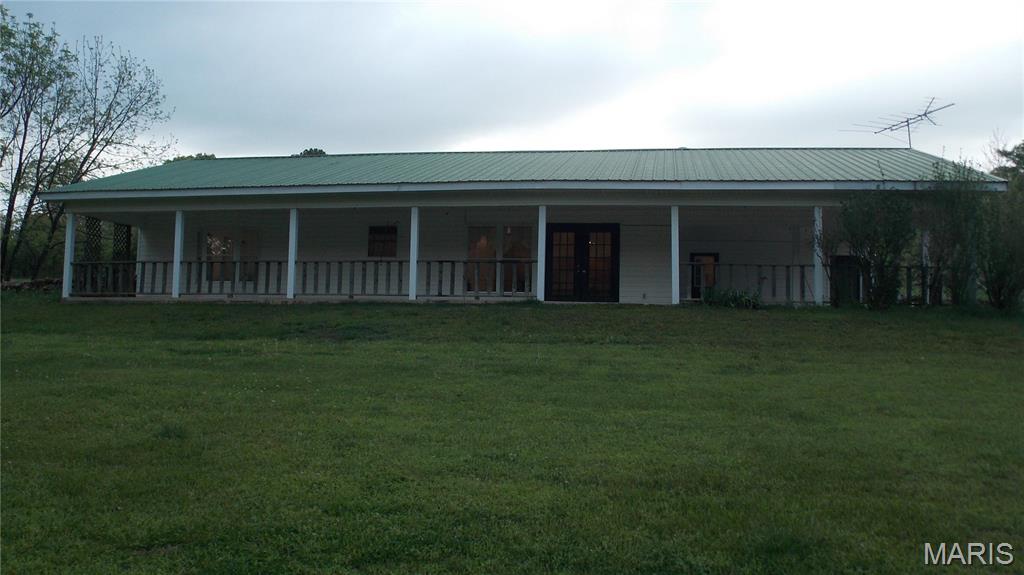 Secluded country living on 4 acres m/l-Peace, Privacy, & Scenic Views! Escape to your own private retreat with this unique 3-bedroom, 2 full bath earthen home nestled at the end of a quiet dead-end road. Surrounded by nature and offering breathtaking scenic views, this property is perfect for those seeking tranquility and space. The spacious primary suite features a stand-alone shower and a relaxing corner soaking tub, creating the perfect place to unwind. A large kitchen with abundant cabinetry provides plenty of storage and room for cooking and entertaining. A full-length covered front porch, ideal for morning coffee or sunsets. The property also includes a double carport, a shed with workshop and lean-to, and a versatile she shed or man cave complete with window air-perfect for a craft room, hobby space, or private getaway. If you are looking for privacy, space, and country charm, this one checks all the boxes!!