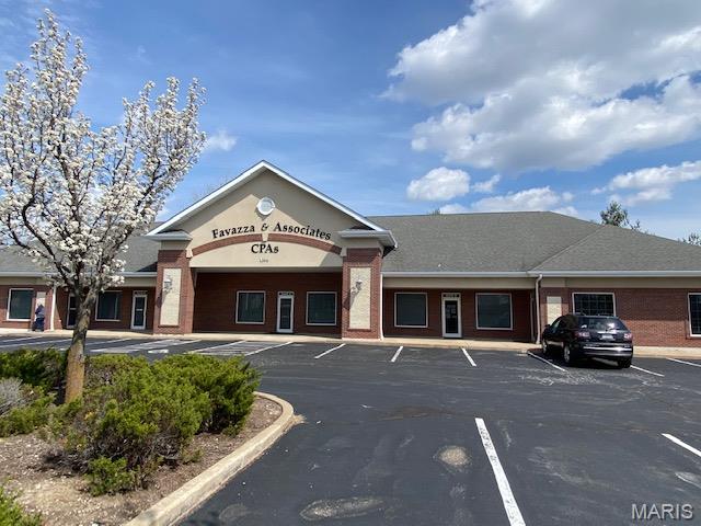 This property has the ability to add an additional fast-food/coffee shop drive through on the extra large parking lot. Their is an existing 5 Suite building of 7,856 sq.ft. The end caps are currently available for an owner-occupier.  Suite B is occupied by a long term tenant who does employee testing/id verification services. Suite C & D is occupied by a long term term tenant who is engaged in insurance services.  Suite A would be perfect for an exercise/fitness facility given its rubber flooring. Suite E is perfect for an office/medical/real estate office business with three separate offices, a large reception area and two open areas for storage, file cabinets or cubicles for additional employees.  See the attached two concept documents, already reviewed by the city of St. Peters and Cottleville Fire District for a potential drive through/coffee shop/fast food stand alone building or a separate stand alone building.  Owner willing to work with buyer of the drive through parcel to sell it separate from the existing building.  Inquire regarding terms. See other separate listings.