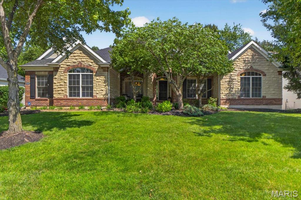 Experience the ease of ranch living with more than 3,000 square feet of beautifully designed living space in this exceptional home. A spacious foyer welcomes you into a stunning vaulted great room filled with natural light, creating an open and inviting atmosphere perfect for both everyday living and entertaining.
The elegant dining room showcases a tray ceiling, while the private home office with glass French doors offers an ideal work-from-home retreat. Thoughtfully designed for today's lifestyle, the open floor plan provides exceptional flexibility and features a convenient butler's pantry for effortless entertaining.
The chef-inspired kitchen is the heart of the home, offering abundant cabinetry, solid surface countertops, a center island, breakfast bar, planning desk, and generous workspace. It opens seamlessly to the sun-filled breakfast room and inviting hearth room, creating the perfect gathering space. An updated powder room, spacious pantry, laundry room, and coat closet complete the main living area.
The expansive primary suite is a true retreat, featuring new carpet, an impressive walk-in closet, and a luxurious en-suite bath with dual vanities, abundant storage, a soaking tub, separate shower, and private water closet.
Two additional generously sized bedrooms are connected by a Jack-and-Jill bath, with a charming flex nook nearby that's perfect for a reading area, homework station, or hobby space.
The enormous walk-out lower level offers endless possibilities for future finishing while providing exceptional storage. Step outside to enjoy the maintenance-free deck or the lower patio, both overlooking a beautifully private, tree-lined backyard—an ideal setting for relaxing or entertaining in every season.
Recent updates provide peace of mind and modern style, including fresh interior paint throughout, new luxury plank flooring, new main-level carpet, a new roof, and newer mechanical systems.
As a resident of the prestigious Lake Saint Louis Community Association, you'll enjoy outstanding amenities including private lakes, clubhouse, golf, tennis, pickleball, beaches, parks, and more—all just minutes from shopping, dining, and major highways.
This is executive ranch living at its finest.
