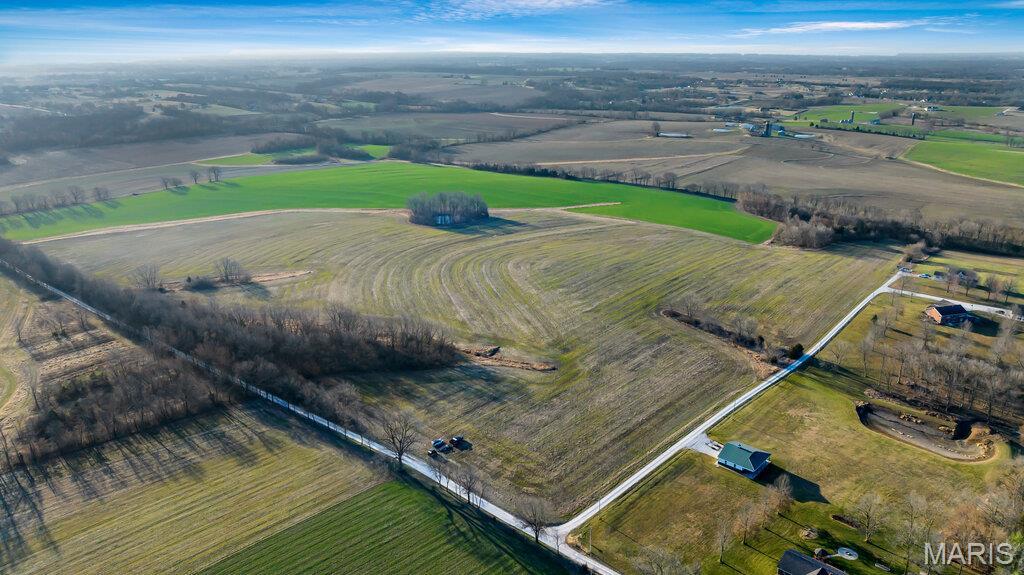 Check out this 31.5+/- acres just on the outskirts of St. Paul, and it's only minutes away from O'Fallon! Just far enough away while still being close enough to all the conveniences. This property offers multiple build sites, and if you’re into outdoor activities, this land is perfect for recreation. There’s plenty of deer sign around, making it a great spot for hunting or just enjoying nature. The land is mostly tillable, so there is great opportunity for income. And let’s not forget the charming county road frontage. It’s just off the pavement, so you can enjoy that peaceful rural vibe without being too far from town. Whether you're looking to build your dream home or looking for a great piece of land to invest in, this could be the one!