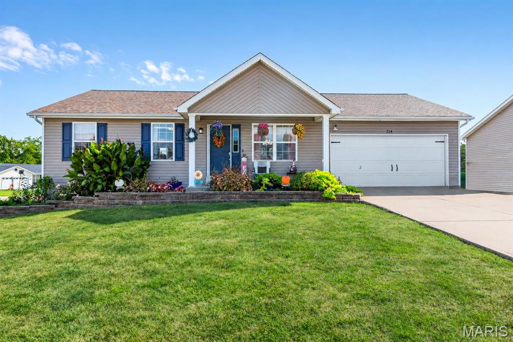 Welcome to this spacious 3-bedroom, 3-bath ranch situated on a large corner lot in Truesdale, conveniently located near the new park and community center. This home offers an inviting open feel with a vaulted ceiling in the living room, updated paint, doors, lighting, landscaping, and a newer roof. The kitchen features hardwood flooring and overlooks the generous 16x12 deck, providing a great space for outdoor dining and entertaining. A convenient laundry area with spacious pantry storage is located just off the kitchen.

The primary suite features a walk-in closet and French doors leading to its own private 6x13 deck, creating the perfect spot to enjoy your morning coffee or unwind at the end of the day. The remodeled primary bath includes a custom tile shower, shiplap accents, updated fixtures, and a WiFi speaker vent.

The finished walkout lower level greatly expands the home's living space with a large family/rec room, full bath, two additional bonus rooms ideal for a home office, hobby room, workout space, or guest accommodations, plus plenty of storage. Step outside from the lower level to a spacious 19x16 covered concrete patio overlooking the yard. Additional features include a mud room and multiple outdoor living areas. Move in and start enjoying all this home has to offer!
