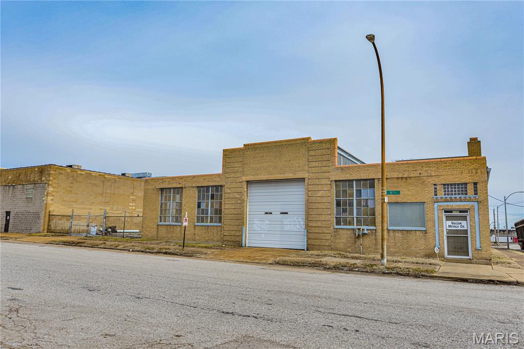 Long-time owner involved in metal fabrication in a wonderful location. The side lot is included in the sale. Most importantly, it is Zone K, allowing for a wide-range of potential uses. The overhead crane runs down the middle of the building, and it will stay as part of the sale. There is a small office near the front of the building.