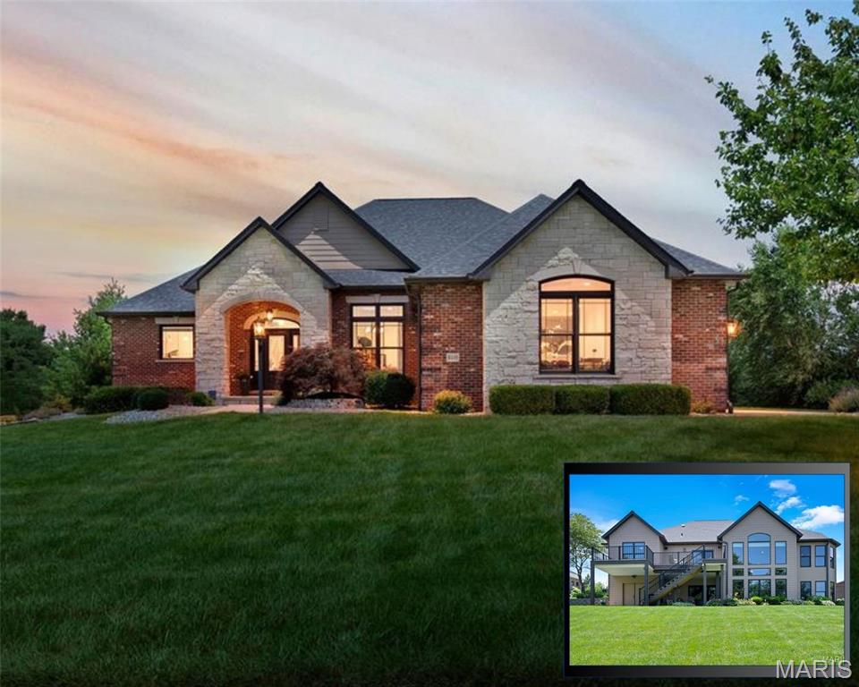 Welcome to Stone Cliff Manor. Perfectly positioned on a beautiful; 1/2 acre lot, this exceptional walk out ranch is a showcase. Offering 4 spacious bedrooms, 5 bathrooms & breathtaking views, you’ll want to see this one! Impressive curb appeal & meticulously landscaped grounds set the stage for what awaits. You'll appreciate the rich solid wood flooring, solid wood doors & trim, elegant arched doorways & an abundance of windows, flooding the home w/natural light while framing the scenic wooded & water views. Inspired by everyday living w/effortless hosting, the open floor plan offers an incredible sense of space & functionality. An expansive living room features soaring ceilings & is perfectly complemented by a  dining room, breakfast nook & convenient guest powder room. Two stunning stone gas fireplaces serve as statement pieces, adding warmth & character to the welcoming living areas on both levels, while dual-zoned HVAC ensures year-round comfort & efficiency. At the heart of the home is the gourmet kitchen, thoughtfully designed for the culinary enthusiast, making everyday & special occasion gatherings effortless. Featuring custom cabinetry, ample prep space, a walk in pantry, high-end finishes & a functional layout that seamlessly connects to the surrounding living & dining areas. Atrium windows ensure the stunning setting remains a focal point while preparing or enjoying a meal. The main level also features a private bedroom wing w/two generously sized bedrooms & shared bathroom. One bedroom, currently utilized as a home office, offers flexibility for today's lifestyle needs. Both rooms preserve privacy, without sacrifice. The luxurious primary suite is a true sanctuary, complete w/a spa-like bathroom for relaxation, two custom-designed closets & awe-inspiring surroundings. Enjoy the calming backdrop that makes this retreat feel worlds away from everyday life. A second primary ensuite on the lower level provides ideal accommodations for guests or multigenerational living. An expansive walk-in closet paired w/exquisite views creates the retreat found on every dream-home wish list. The lower level's cozy fireplace, wet bar w/hickory cabinetry & stone, atrium windows & oversized patio doors continue to frame the exceptional lake setting, allowing the same incredible picturesque scenery to be enjoyed. Storage is plentiful! Oversized closets are seamlessly integrated throughout. Every detail of this residence has been carefully curated & impeccably cared for, highlighting superior workmanship & pride of ownership. Outdoor living is equally impressive. The new Trex composite deck, enhanced w/a RainTight under-decking system & stairs to the lower patio, provides the perfect setting to savor quiet mornings or unwind in the evenings as wildlife graze the water's edge. The tranquil setting creates an atmosphere that is simply unmatched. This home is brimming w/upgrades & improvements: an irrigation system, a whole-house managed security system, wired ethernet & coax connections to all rooms, a central vacuum system, a negotiable whole-house sediment & carbon water filtration system, an active radon mitigation system, a 50-gallon water heater & replacement roof shingles completed in 2024. Additional features include two furnaces & two central air conditioning units, along w/a whole-house humidifier. Two 200-amp panels provide adequate space for your future enhancements. Other highlights include a spacious 3-car side-entry garage, a separate garden garage & an incredible workshop space ideal for hobbies, projects, or personal customization. Highly desirable Edwardsville School District & minutes from interstates, shopping, dining & convenience, Stone Cliff Manor offers the perfect balance of privacy & accessibility. Exceptional quality construction, refined finishes, generous living space, extensive updates & unforgettable views, this remarkable property offers more than just a home, it offers a lifestyle you'll never want to leave.