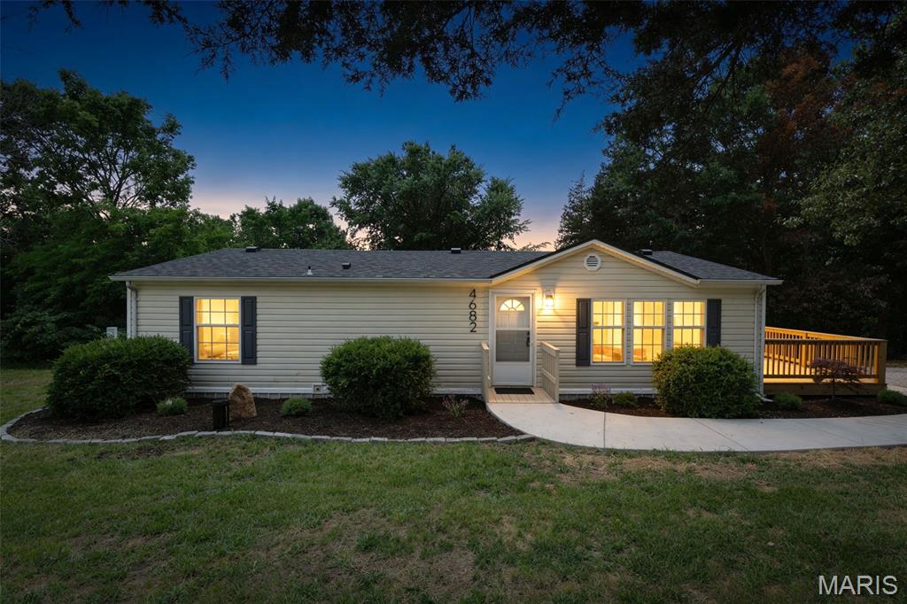 Beautifully updated 2-bedroom, 2-bath home situated on 1.28 acres! Offering 1230+/- sqft of living space, this property features a spacious primary suite with plenty of room to relax and unwind. Recent updates include new flooring, fresh paint, new deck, and new appliances, making this home move-in ready. Enjoy the peaceful setting with ample outdoor space for gardening, recreation, or simply enjoying the country atmosphere. A great opportunity to own a well-maintained home with modern updates and room to spread out. Property is agent-owned.