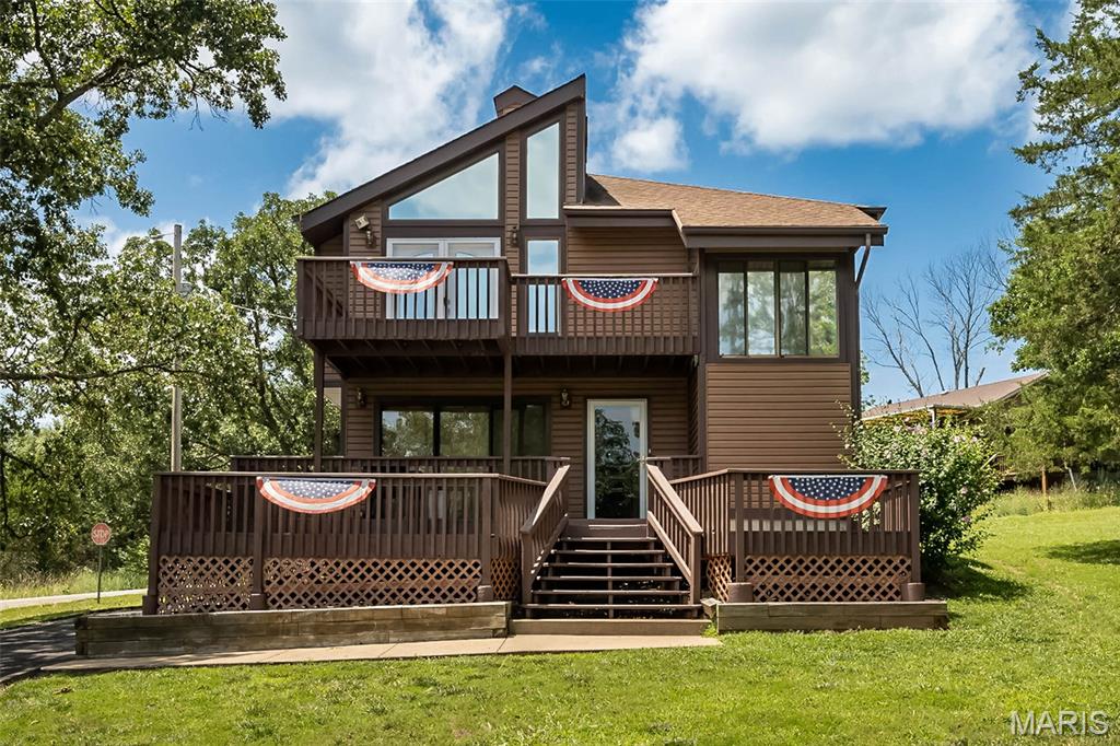 Lake living meets thoughtful updates in this inviting home located on over half an acre double lot! Nestled in the sought-after Lake St. Clair community, enjoy an open and spacious floor plan featuring vaulted ceilings, a generous living room, and an open kitchen and dining area designed for everyday living and entertaining. Step onto the upper-level balcony to relax with your morning coffee while taking in the peaceful surroundings.
Step outside to your own private backyard retreat featuring an above-ground pool, perfect for cooling off on warm summer days, entertaining friends and family, or simply relaxing in the privacy of your outdoor space.
Major improvements completed in 2025 and 2026 provide added value and peace of mind, including all new electrical switches, outlets, and faceplates throughout the entire home, new flooring in the lower level, UV window film installed on the large upstairs windows for improved energy efficiency and comfort, and an HVAC system professionally cleaned and serviced in April 2026.
Need space for hobbies, storage, or your next project? You'll love the impressive new 20x30 detached shop complete with electricity perfect for a workshop, recreational vehicles, boats, or extra storage.
Located in the desirable Lake St. Clair community, you'll enjoy access to the lake and all the recreational opportunities it offers while coming home to a property that's been meticulously maintained and thoughtfully updated. From the private pool to the oversized Workshop and recent upgrades, this property offers the perfect blend of comfort, functionality, and lake lifestyle.