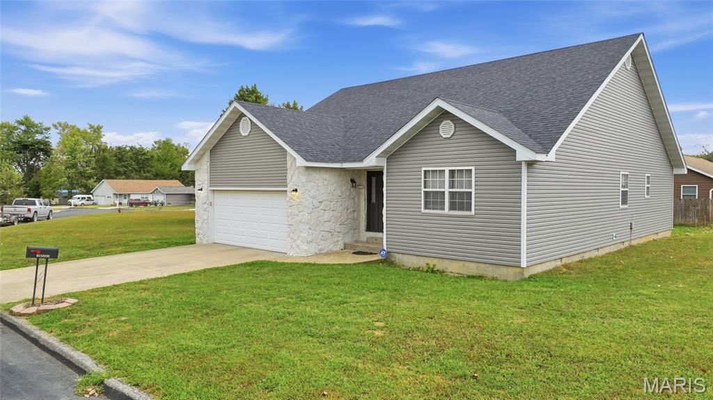 Quality 3-bedroom, 2 bath ranch style home in excellent neighborhood on a corner lot in Mountain Grove for sale. Inside, you'll find a welcoming foyer that leads to an oversized living room with a fireplace. Galley style kitchen has been refreshed with stainless steel appliances that are just under a year old. Additional updates include newer flooring and roof with a new hot water heater. Solid home ALSO has been encapsulated in crawl space for peace of mind. There is a deck on the back of the home to enjoy the outdoors. Additional lot connects to home available for purchase. We can't forget LOW TAXES! Call today to view this home!