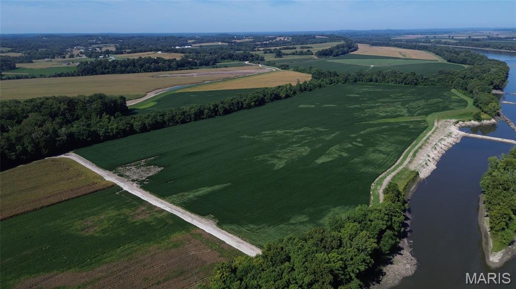 Looking for Riverfront Bottomground in Washington MO?! Well this incredible 112 acre parcel might be the perfect fit for you. Sitting just 5 minutes to Washington, this sprawling row crop parcel fronts on the Missouri River and includes a section of land on the St Johns Island. Featuring High crop yields, gravel road frontage, and convenient access to the highway and local cooperative, this property provides both production and convenience in operations to ensure good cashflow.  Some Wooded areas for hunting season activities. Adjacent 67 m/l acres of Riverfront Bottomground also available, see MLS#25066868 for more information. The family farmstead on 125 acres with farmhouse and barns is also listed for sale, see MLS#25066707.  Whether looking for the right crop producing parcel or fully functioning farm, HERE is THE BEST opportunity around Washington in a Lifetime. This property is for sale for the first time in decades, so don't hesitate!