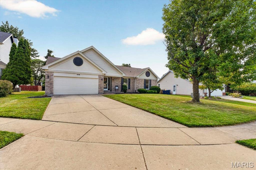 Welcome to 4116 Joyful Ct! Fresh, bright and beautifully renovated, this ranch is ready for you to move in and enjoy. Step inside and the vaulted great room immediately grabs your attention, with soaring ceilings, a fireplace and plenty of natural light. New luxury vinyl plank flooring, fresh paint, six-panel doors, baseboards, ceiling fans and updated lighting give the home a clean, cohesive look throughout.

The kitchen has been refreshed with quartz countertops, painted cabinetry, new appliances, a center island and a good-sized pantry—plenty of space for everyday cooking or gathering with friends. Just beyond, the dining area and new Pella slider open to the patio and backyard, making it easy to take dinner outside or relax at the end of the day. A dedicated main-floor laundry room keeps everyday living conveniently on one level.

At the end of the day, retreat to the spacious primary suite and its private bath with a soaking tub, separate shower and double vanity. Two additional bedrooms offer plenty of flexibility for family, guests or a home office. All three bedrooms feature brand-new windows and new recessed LED lighting, giving each room a bright, updated feel. Both bathrooms have been refreshed with ceramic tile, new vanities, toilets, plumbing fixtures and mirrors.

Downstairs, the large unfinished basement offers tons of storage, a newly added sump pump and plenty of possibilities for future finished space.

Updated where it counts, comfortable where it matters and designed for easy everyday living—4116 Joyful Ct is ready for its new home owner.