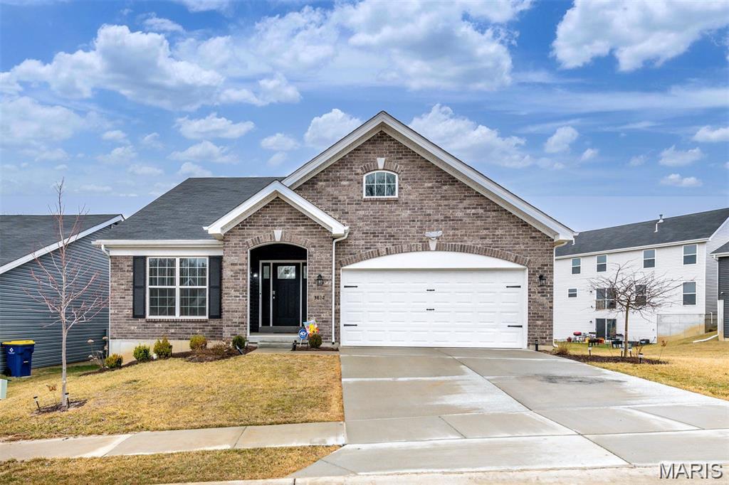 Welcome home to this beautiful 2024 McBride-built ranch offering modern finishes, an open-concept design, and room to grow! The spacious main living area features luxury vinyl plank flooring, vaulted ceilings, modern lighting, and a large ceiling fan, creating a bright and inviting atmosphere.

The stunning kitchen is the heart of the home, showcasing quartz countertops, a center island with breakfast bar, 42-inch white cabinetry, stainless steel appliances, recessed lighting, and stylish pendant fixtures.

Retreat to the spacious primary suite featuring a walk-in closet, double vanity, linen closet, and a large 5-foot walk-in shower. Main-floor laundry and main-level bedrooms provide everyday convenience.

The walk-out lower level offers endless possibilities for future finishing and outdoor living, with potential for a future deck overlooking the backyard. Enjoy the benefits of newer construction without the wait, plus a remaining 1-year utility systems warranty for added peace of mind.

Don't miss your opportunity to own this move-in ready home in a desirable Florissant location!