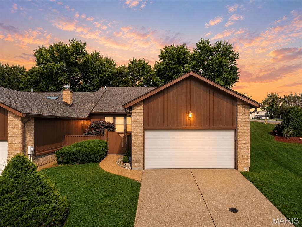OPEN HOUSE CANCELED! Enjoy effortless villa living in the beautiful Court of Cedars community! This sprawling 2 bed/1 bath unit is conveniently located on a corner and features a private backyard area and attached 2 car garage. Upon entering, you’ll be welcomed by soaring vaulted ceilings, rich hardwood flooring, and an abundance of windows providing natural light throughout the living space. The updated kitchen features white custom cabinetry, stainless steel appliances, an a center island with gas range providing ample counter space fit for a chef. Enjoy the perks of main level laundry and access to your private patio from the kitchen. Both bedrooms are generously sized and include walk-in closets, providing exceptional storage and organization. The large bathroom offers a relaxing retreat with a tub and shower, separated on either side of the double vanity. Downstairs, an expansive unfinished basement presents endless possibilities for future finishing or simply keeping seasonal items neatly tucked away. You won’t want to miss this move-in-ready villa!