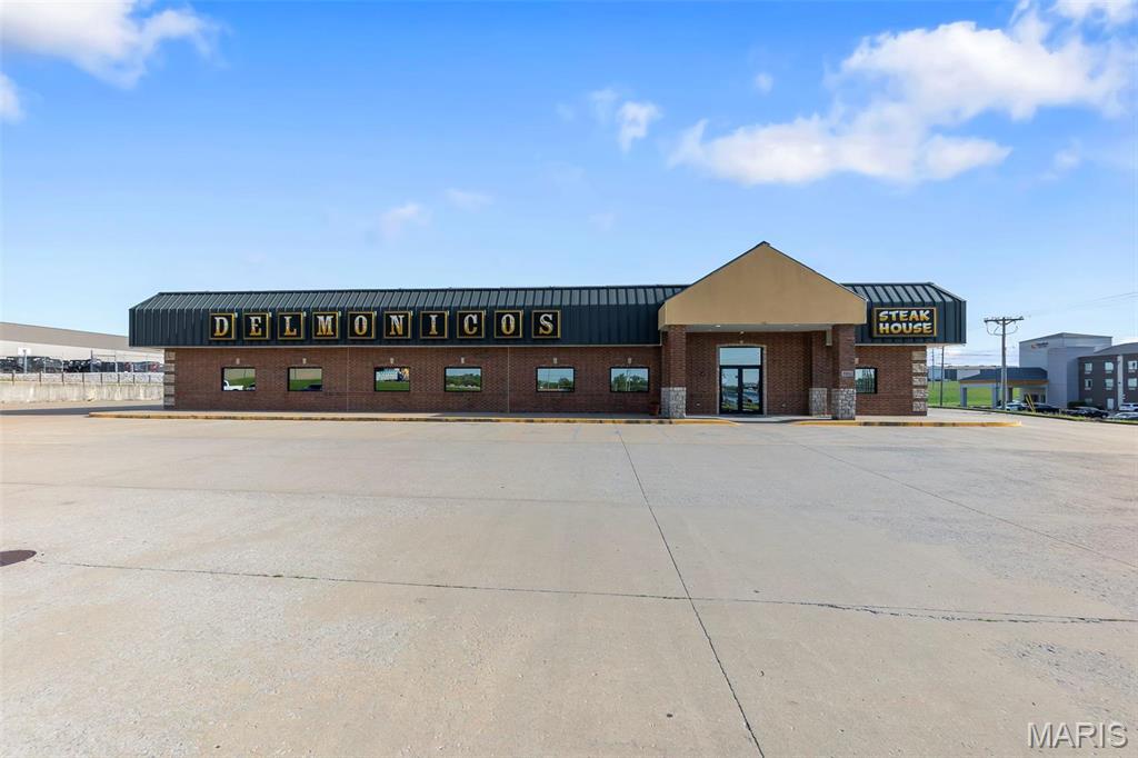 This 8,970 SF metal-frame commercial building on 1.38 acres offers a low-maintenance exterior and flexible C2 zoning. Built in 2010 and currently used as a restaurant, the property is well-suited for conversion to retail, strip center, medical office, or other commercial uses. Features include 3-phase electrical, ample parking, and excellent site access. The property also features a spacious banquet room that can be partitioned into three separate sections, a fully equipped commercial kitchen, and a dedicated bar area. Located just off I-55 near hotels, gas stations, major highways, and the Cape Girardeau Sportsplex, the property sits in a high-traffic corridor with strong visibility. Jackson, MO is experiencing consistent commercial and residential growth, making this an ideal location for investment or business expansion. Don’t miss this opportunity to capitalize on one of Southeast Missouri’s most active and rapidly developing markets. Location: City, High Traffic, Hwy/Interstate Frntg