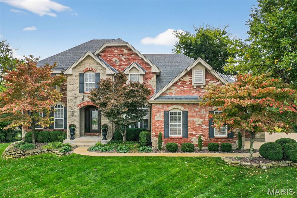 This impeccable home is one you won’t want to miss! Perfectly situated on a quiet cul-de-sac in the beautiful Tapawingo subdivision, it offers a seamless blend of modern luxury and timeless comfort. Thoughtfully updated throughout, this 5-bedroom, 3.5-bath residence is designed to impress.Step into the inviting foyer and take in the soaring two-story great room, filled with natural light and open to the kitchen—perfect for everyday living and entertaining. The main floor also features a formal dining room, an eat-in kitchen, a cozy hearth room, laundry, and a spacious primary suite with a stunning ensuite bath. The kitchen is a chef’s dream with quartz countertops, custom cabinetry offering ample storage, stainless steel appliances: a built-in Bosch refrigerator/freezer, dual convection ovens and Viking gas cooktop. The adjoining hearth room boasts accordion doors that open to a spectacular four-season room with a fireplace and panoramic views of the 5th fairway of the Woodlands course. Upstairs, you’ll find three additional bedrooms, a full bath, and a loft overlooking the great room—an ideal spot for work, study, or relaxation.The lower level is made for entertaining and unwinding, featuring a recreation room with a fireplace and wet bar, plus a fifth bedroom and full bath with a walk-in shower. Step outside to your own resort-style oasis with a gunite PebbleTec pool and waterfall, outdoor living room with fireplace, built-in speakers, heaters, and a motorized retractable shade.Fitness enthusiasts will appreciate the dedicated home gym and cardio theater. After your workout, unwind in the outdoor six-person spa (included) or enjoy the brand-new outdoor sauna (available for purchase). The whole home is smart technology/automation equipped. Located just minutes from highway access, Laumeier Sculpture Park, shopping, and the 27-hole Gary Player–designed Tapawingo Golf Course, this home truly offers luxury living in an unbeatable location.