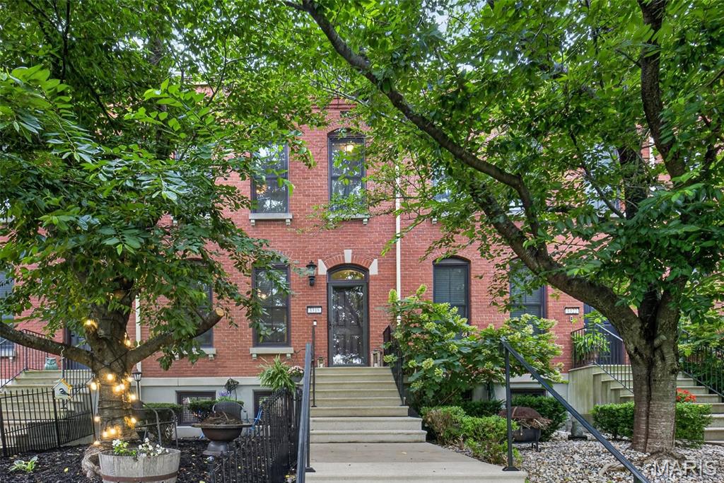 Fantastic opportunity in sought-after New Town! Loaded with character and thoughtful updates. Overlooking Civic Green Park, this home offers picturesque views and a front-row seat to one of New Town's most desirable green spaces. The inviting interior features charming architectural details, stylish finishes, abundant natural light, and a warm, welcoming feel throughout. The open-concept main level is ideal for everyday living and entertaining, while the spacious bedrooms and well-appointed baths provide plenty of room for family or guests.

The finished lower level is a standout feature, offering an incredible entertaining space complete with a recreation area and half bath—perfect for hosting game days, movie nights, or casual get-togethers. This versatile space adds significant living and entertaining potential beyond the main level.

Additional highlights include a tuck-under 2-car garage, upstairs laundry and an unbeatable location just steps from New Town's lakes, pools, restaurants, shops, canals, and year-round community events. Enjoy the charm, convenience, and lifestyle that make New Town one of St. Charles County's most sought-after communities.