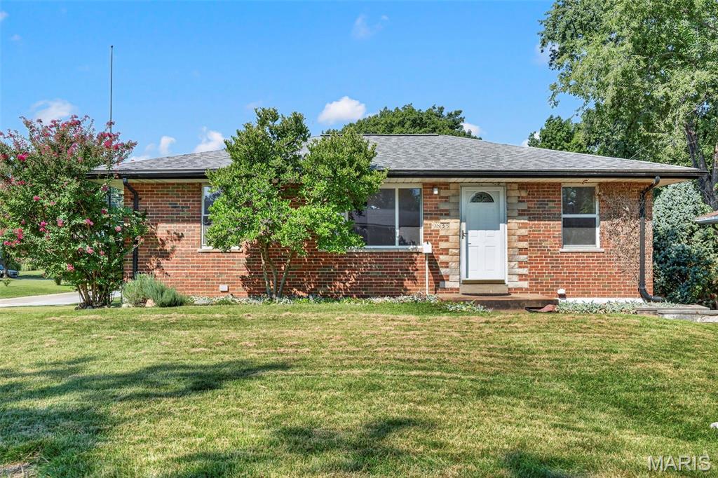 Welcome to this charming 2-bedroom, 1-bathroom ranch home tucked away in a desirable neighborhood! Step inside to find gorgeous hardwood floors running through the main living areas, accentuating the clean look of classic 6-panel white doors. The bright kitchen is outfitted with solid 30" oak cabinets, offering plenty of storage and functionality for your everyday needs.

The main level easily flows out to a sturdy, well-maintained deck that overlooks a beautiful, level backyard—ideal for outdoor entertaining, gardening, or relaxation. Downstairs, the partially finished walk-out basement provides valuable additional living space along with rough-in plumbing ready for a 2nd bathroom conversion, giving you fantastic potential to expand and build instant equity.

Car enthusiasts, hobbyists, and tradespeople will fall in love with the exceptional exterior setups:

Detached Oversized 2-Car Garage: Fully insulated walls and ceiling, equipped with a dedicated 60-amp panel, plus heating and cooling for year-round usability.

Covered 2-Car Carport: Attached to the garage to provide ample covered parking or extra shade for work projects.

Circular Driveway: Sweeps gracefully from one side of the lot to the other for effortless access and parking.

Key Highlights:

Roof: Only 6 years old, offering great peace of mind.

Layout: Efficient, low-maintenance single-story ranch living.

Opportunity: A perfect starter home situated in a highly sought-after location!
