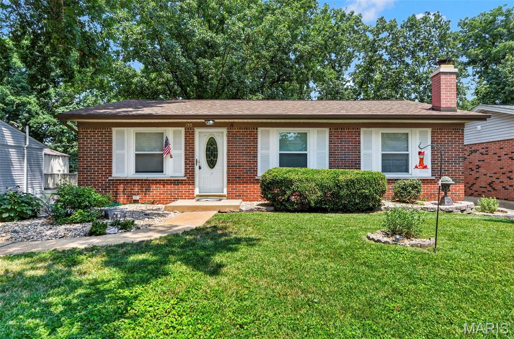 Welcome to this charming 3-bedroom, 1.5-bath home located in the highly desirable Oakville High School District. Filled with natural light, the inviting living room and main living areas feature luxury vinyl flooring, creating a warm and welcoming atmosphere. The spacious eat-in kitchen offers abundant cabinet and counter space and opens through sliding glass doors to a large deck overlooking the private, tree-lined backyard—an ideal setting for morning coffee, outdoor dining, or entertaining family and friends.

The primary bedroom includes its own convenient half bath, while two additional bedrooms and a full hall bath complete the main level. The walk-out lower level expands your living space with a cozy family room featuring a corner fireplace, a large utility room with ample storage, and an expansive unfinished area ready for your personal touch, whether you envision a recreation room, home office, or additional living space. Step outside from the family room to the covered patio and enjoy the peaceful backyard surrounded by mature trees.

Conveniently located near schools, shopping, restaurants, and major highways, this home offers the perfect combination of comfort, space, and everyday convenience.

Don't miss your opportunity to create the vision you desire in the location you want!