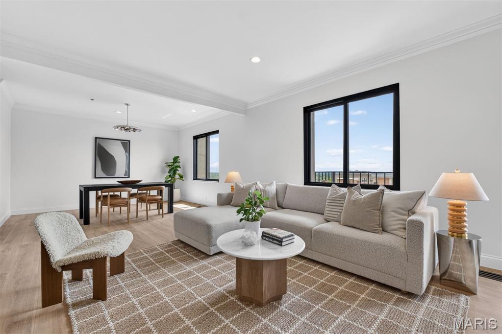 Welcome to luxurious essentials in this fully renovated 1-bedroom, 1.5-bath residence in the heart of Clayton. Thoughtfully redesigned from top to bottom, this turnkey home blends elevated finishes with effortless, low-maintenance living.

The open-concept layout features a brand-new gourmet kitchen with designer appliances, stone countertops, and a dedicated coffee bar—perfect for both everyday living and entertaining. New flooring, updated lighting, and custom California Closets throughout provide a clean, cohesive feel with exceptional functionality.

Enjoy the convenience of a full-size, state-of-the-art all-in-one washer/dryer and voice-controlled smart home features, allowing you to manage lighting, temperature, and laundry with ease.

The spacious primary bedroom offers generous storage with custom closets, while a beautifully updated full bath and an additional half bath provide both comfort and flexibility for guests.

Step outside to your private balcony and take advantage of the building’s full-service amenities, including 24/7 door attendant, on-site management, garage parking, dog park, newly renovated pool with fire pit area, and a vibrant social calendar.

All of this in a premier Clayton location—offering the rare combination of move-in ready luxury with some of the lowest condo fees and taxes in the building.