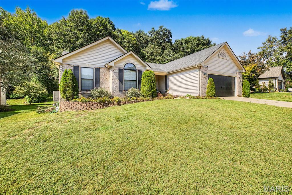 Welcome to your new home at 765 Emerald Oaks Court! This beautifully maintained ranch offers an inviting open floor plan, thoughtful updates, and comfortable living spaces throughout.
The main level features vaulted ceilings and stunning Brazilian cherry hardwood floors. The spacious family room showcases a gas fireplace and opens seamlessly to the kitchen and dining area, creating an ideal setting for everyday living and entertaining. The kitchen boasts white cabinetry, granite countertops, under-cabinet lighting, and a stylish tiled backsplash.
The primary suite offers a large walk-in closet with custom built-ins and a private full bath featuring double sinks, a deep soaking tub, and a walk-in shower. Two nicely sized secondary bedrooms, an updated second full bath, and convenient main-level laundry complete the first floor.
The finished lower level provides even more living space, including a comfortable family room perfect for movie nights, a full wet bar with ample cabinet storage, a bonus/workout room, a third full bath, and a fourth bedroom or sleeping room. You will enjoy sipping your morning coffee and watching the sunrise in the cozy sunroom. 
Step outside to enjoy beautiful landscaping, a covered front porch, rear patio, and side deck. The private backyard offers a peaceful setting with views of nature. Beautifully maintained and truly move-in ready, this inviting ranch home offers the space, comfort, and privacy you've been looking for.