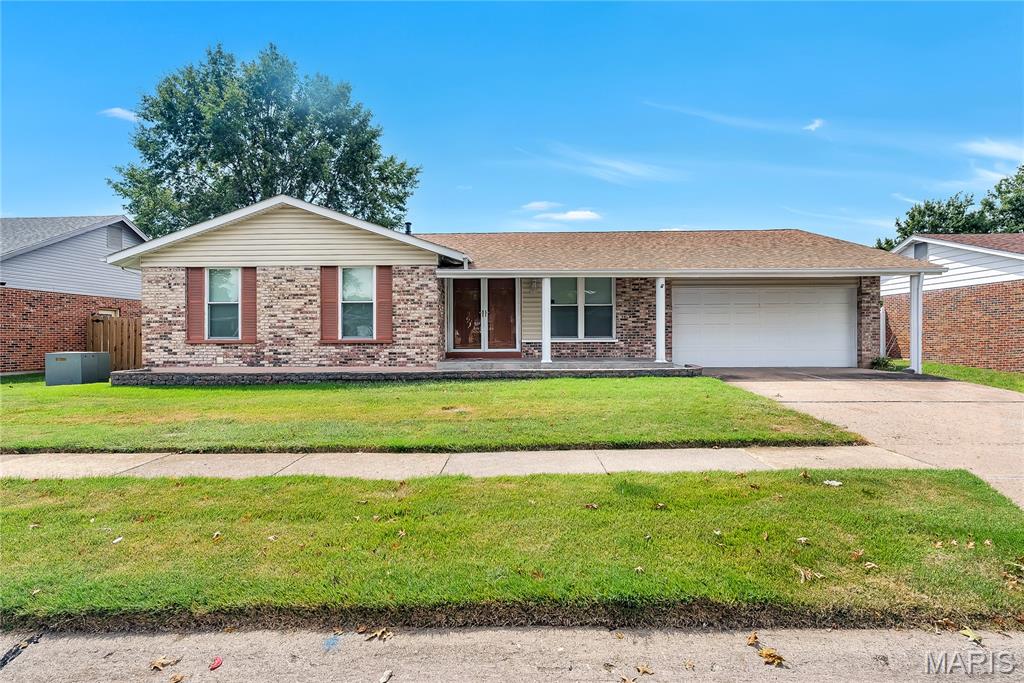 This FABULOUS Ranch Home TRULY SHINES WITH PRIDE OF OWNERSHIP! Greeted by a lovely front porch, enter to find a Light, Bright interior boasting spacious rooms with gleaming wood floors throughout, stylish decor, attractive lighting, and UPDATES GALORE! Entry foyer with ceramic tile flooring opens nicely to the main living areas. The spacious living room with crown molding has been expanded into the original dining area, adding valuable extra space. Enjoy a beautifully updated Kitchen with tile flooring, an abundance of white shaker-style cabinetry, glass tile backsplash, hard-surface counters, black stainless appliances, a serving island, and a convenient breakfast bar with seating. The adjoining family room is currently used as the dining room... perfect for gathering with family and friends in front of the inviting gas fireplace!  From here, step out to a nice stamped concrete patio and pretty fenced yard for outdoor enjoyment and entertaining!  The primary bedroom features crown molding and a lovely updated en-suite Bath and walk-in closet. Bedrooms two and three are serviced by the updated hall bath. Convenient main-floor laundry room is located off the Kitchen and leads to a delightful screened porch!  Great additional living space found in the finished lower level boasting the 3rd full bath, 2 bonus rooms, and a large rec/family room with LV plank flooring!  Plenty of storage space plus a 2-car garage!  This is truly a special home…. Come ‘buy’ today!