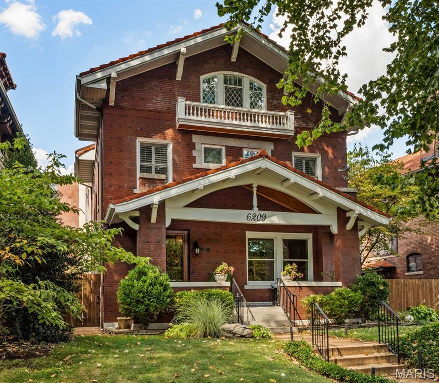 Don’t miss this elegant 5-bedroom, 3-story Parkview home with its beautiful 1909 architectural details: a welcoming entryway featuring a magnificent stained glass window, exposed brick wall, gleaming hardwood floors, original woodwork, and a fabulous flow for entertaining.  Large living room with gas fireplace leads to a library, dining room, eat-in kitchen and 1/2 bath.  The kitchen boasts large maple cabinets and granite countertops that provide ample storage and work space. The family/bonus room off of kitchen has another gas fireplace and an entrance to the fenced back yard with a large wrap around deck.  The landscaped yard features mature plantings and a magnificent water feature that provides year round enjoyment. Several stained glass windows adorn the second floor.   Here you’ll find a primary suite with a renovated en-suite bath and walk-in closet, two more large bedrooms and an updated hall bath with second-floor laundry closet hookups.  The third floor offers even more flexibility with two additional bedrooms, lots of storage and a full bath—perfect for guests or a private home office.  The basement is partially finished and can be used as another recreational space, playroom or work-out room.  It has a 1/2 bath, laundry area and built-in shelving.  Current homeowners have lovingly maintained the home for over 40 years with kitchen, baths, and systems upgrades, including the addition of zoned heating and a new roof in 2018. Parkview is known as an "urban oasis" with its curving tree-lined streets, parks, and neighborhood seasonal events, (concerts, winter carriage rides, cook-offs, food trucks, Easter egg hunts and a petting zoo).  This vibrant community is within walking distance of Washington University, Forest Park, popular restaurants, shops, and two MetroLink stations. Parkview is on the National Historic registry. See website for Indentures, neighborhood info, occupancy (single family only) http://www.parkviewneighborhood.org/new-residents, and renovation restrictions.