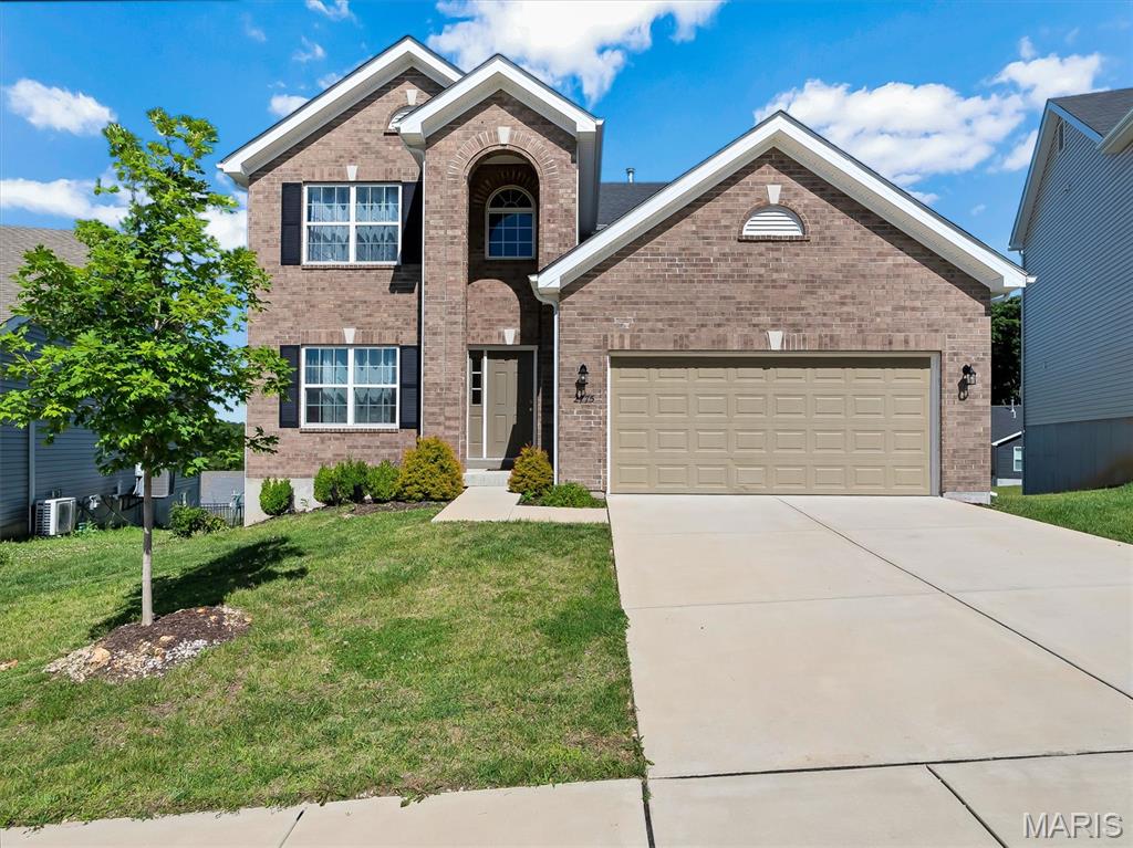 Welcome home to this beautifully maintained two-story residence featuring an attractive brick elevation and a bright, open floor plan designed for modern living. The main level boasts impressive 9-foot ceilings and durable luxury vinyl plank flooring throughout, creating a seamless and stylish feel. The neutral white kitchen is equipped with stainless steel appliances and offers a welcoming breakfast area that flows effortlessly into the spacious family room—perfect for everyday living and entertaining. A convenient main-floor laundry room and half bath add to the home's functionality. Upstairs, you'll find four generously sized bedrooms and two full bathrooms, including a comfortable primary suite designed for relaxation. The unfinished walk-out basement provides endless possibilities for future living space, storage, or customization to fit your needs. Combining timeless appeal, practical living spaces, and room to grow, this home is ready for its next owner to make it their own.