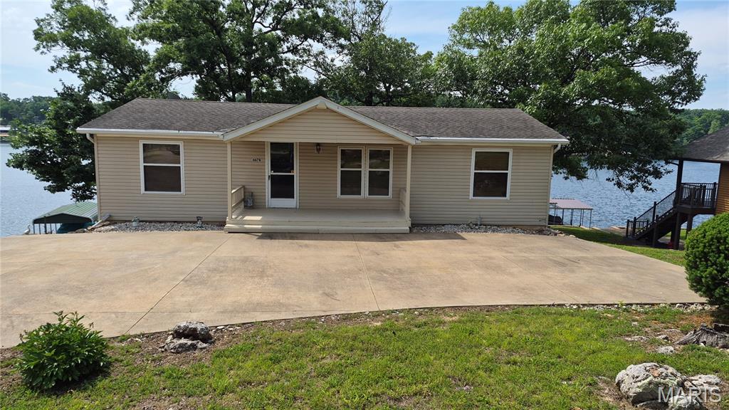 LOCATION, LOCATION, LOCATION!!   Here a rare chance at a prime location in the Lake Community of Goose Creek.  Remarkably well maintained 3 bed, 2 bath manufactured home on a concrete basement.  Enjoy the view and location of this home right on the water.  Home feautures large bedrooms  , full kitchen , washer and dryer included.  Lower level has a half bath , walk out to covered patio and steps to waterfront where you will find a single slip boat dock, deep water.